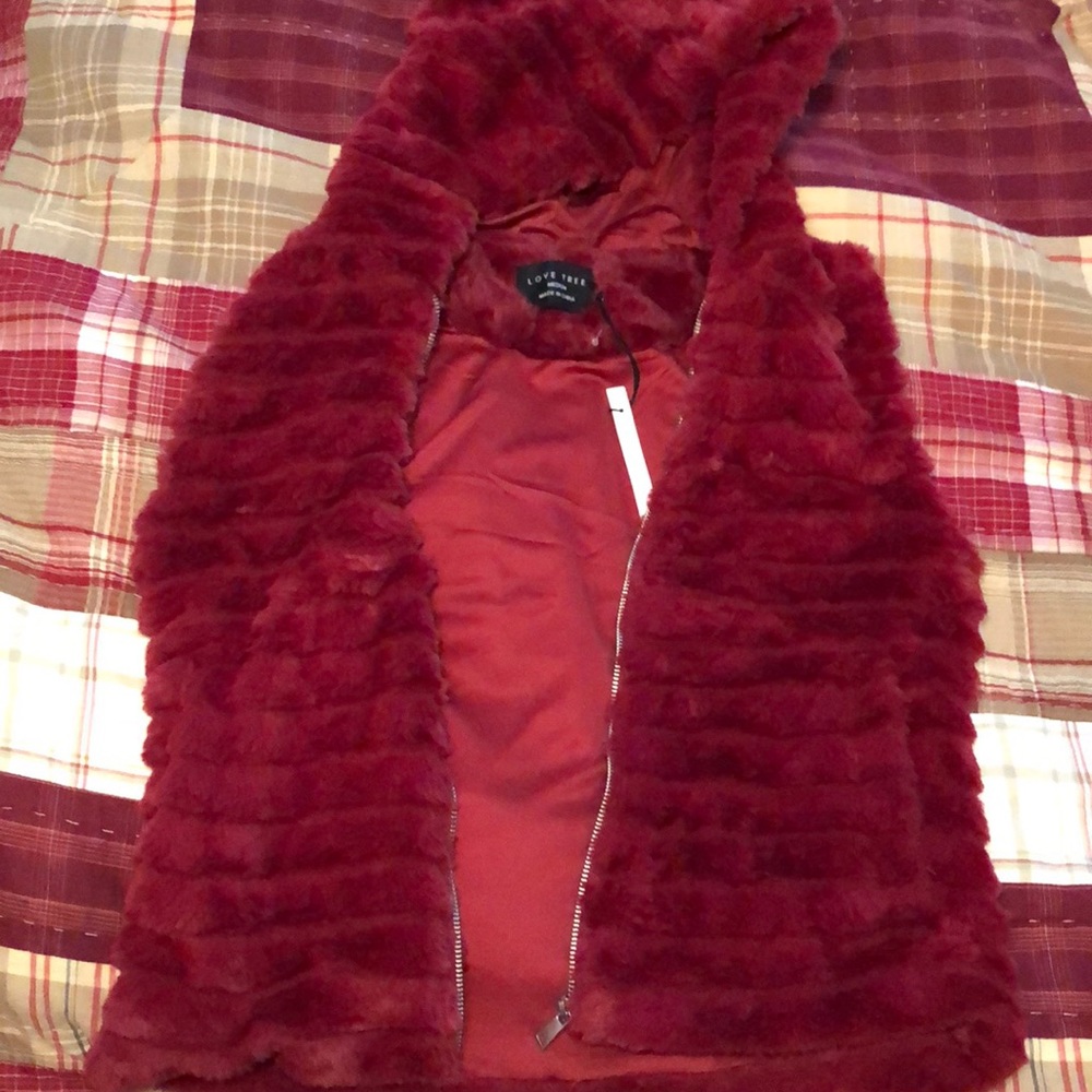 Brand new red faux fur vest with a hood